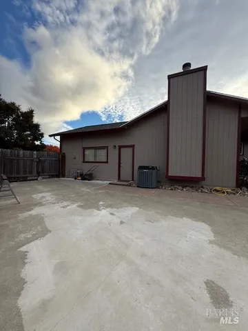a house view with a backyard space