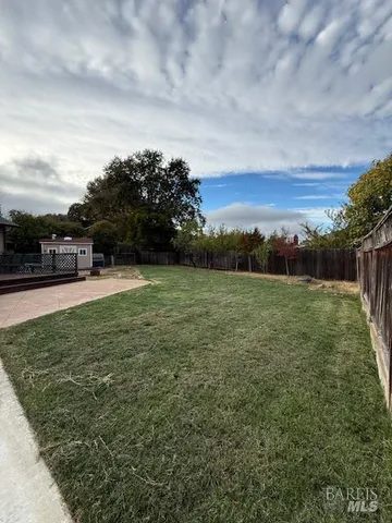 a house view with a garden space