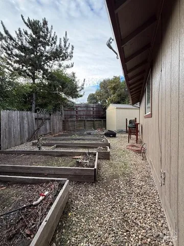 a backyard of a house with lots of green space