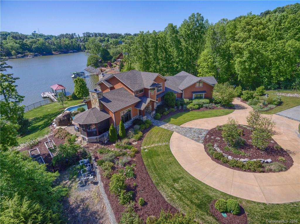 2649 River Ridge Place Fort Mill, SC 29708 - Photo 1 of 34 an aerial view of a house with outdoor space and lake view