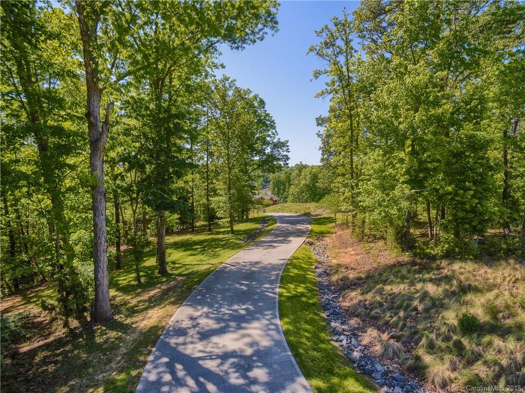 2649 River Ridge Place Fort Mill, SC 29708 - Photo 2 of 34 a view of a yard with flower plants