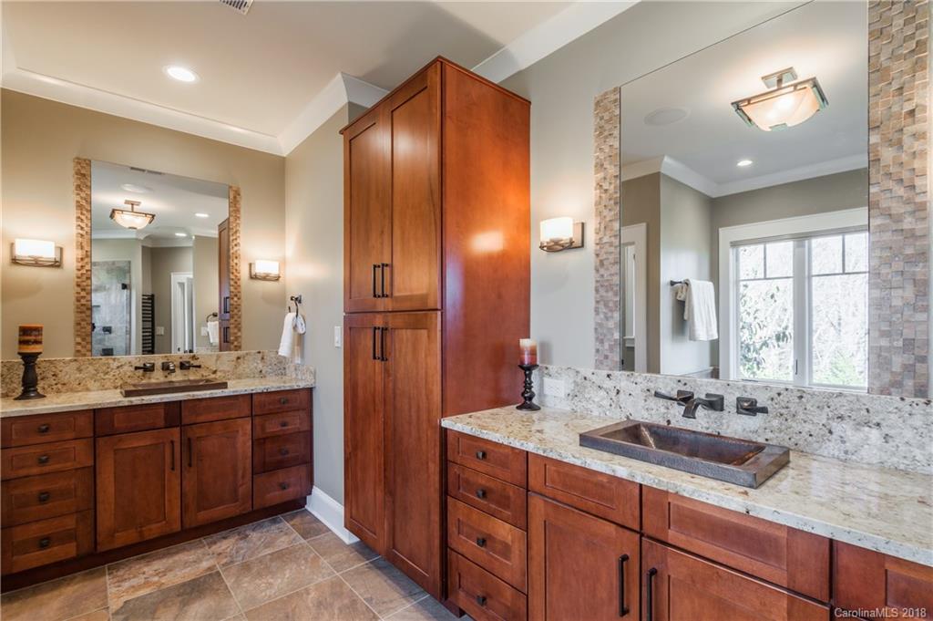 2649 River Ridge Place Fort Mill, SC 29708 - Photo 16 of 34 a bathroom with double vanity sinks double vanity and a mirror