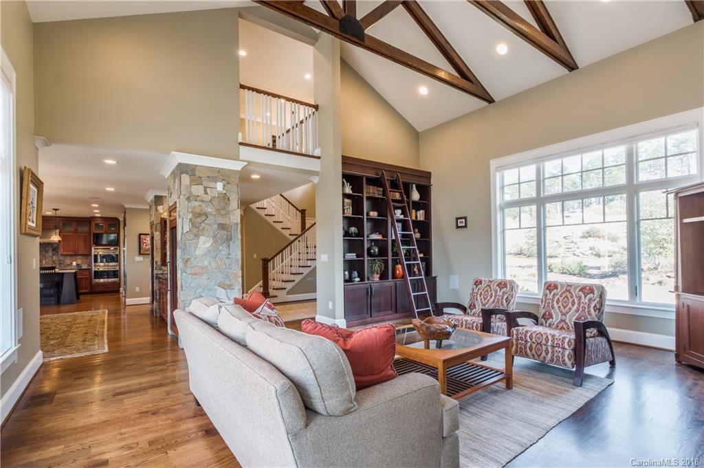 2649 River Ridge Place Fort Mill, SC 29708 - Photo 7 of 34 a living room with furniture a rug and a large window