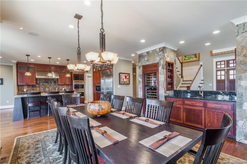 2649 River Ridge Place Fort Mill, SC 29708 - Photo 9 of 34 a dining room filled with furniture and chandelier