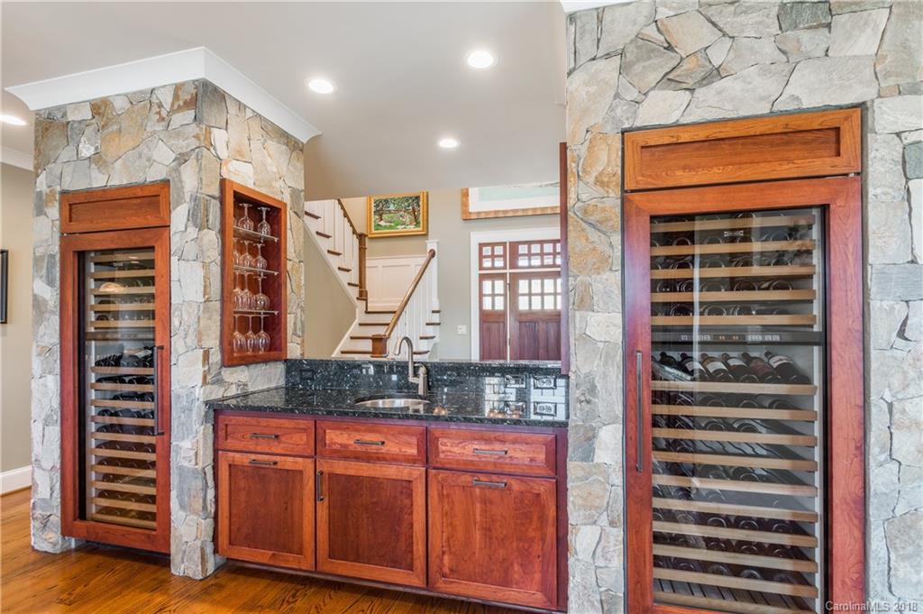 2649 River Ridge Place Fort Mill, SC 29708 - Photo 10 of 34 a view of kitchen with granite countertop a sink and a dishwasher