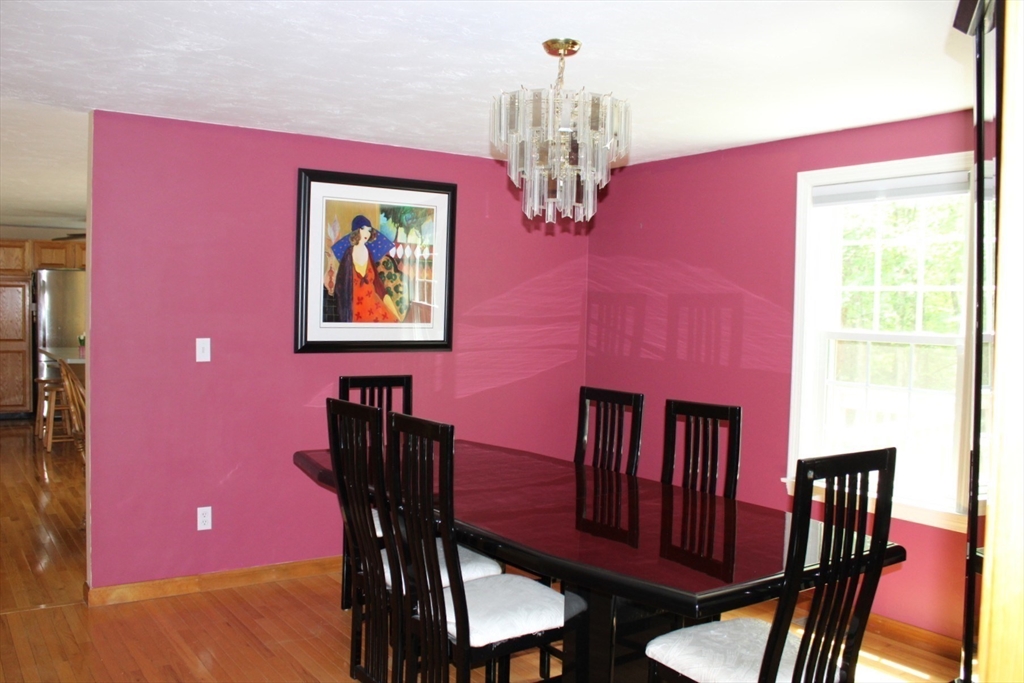 27 Gretchen Way Raynham, MA 02767 - Photo 7 of 20 a view of a livingroom with furniture window and wooden floor
