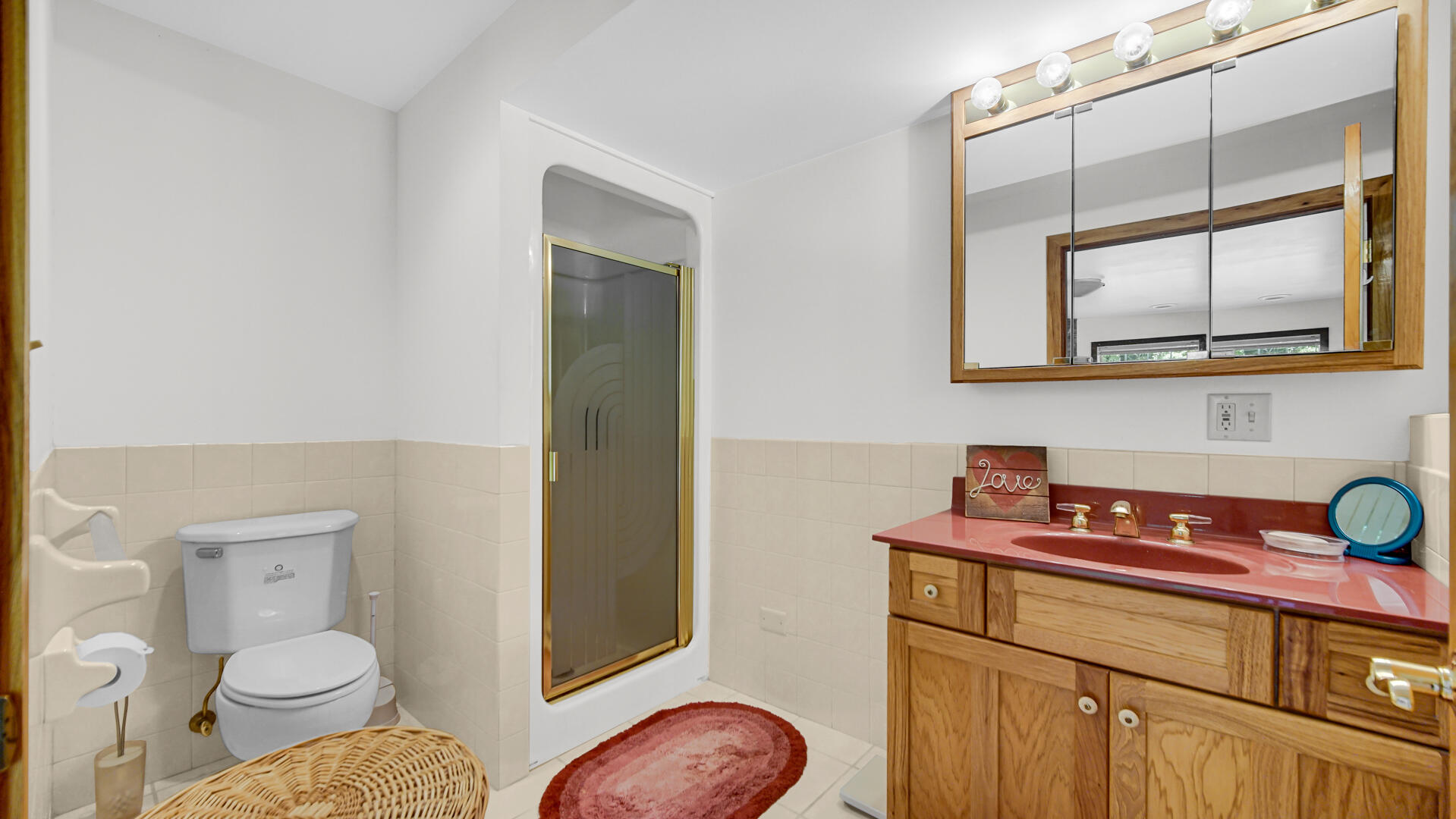 11339 West Snyder Road Westville, IN 46391 - Photo 18 of 27 a bathroom with a toilet a sink and a shower