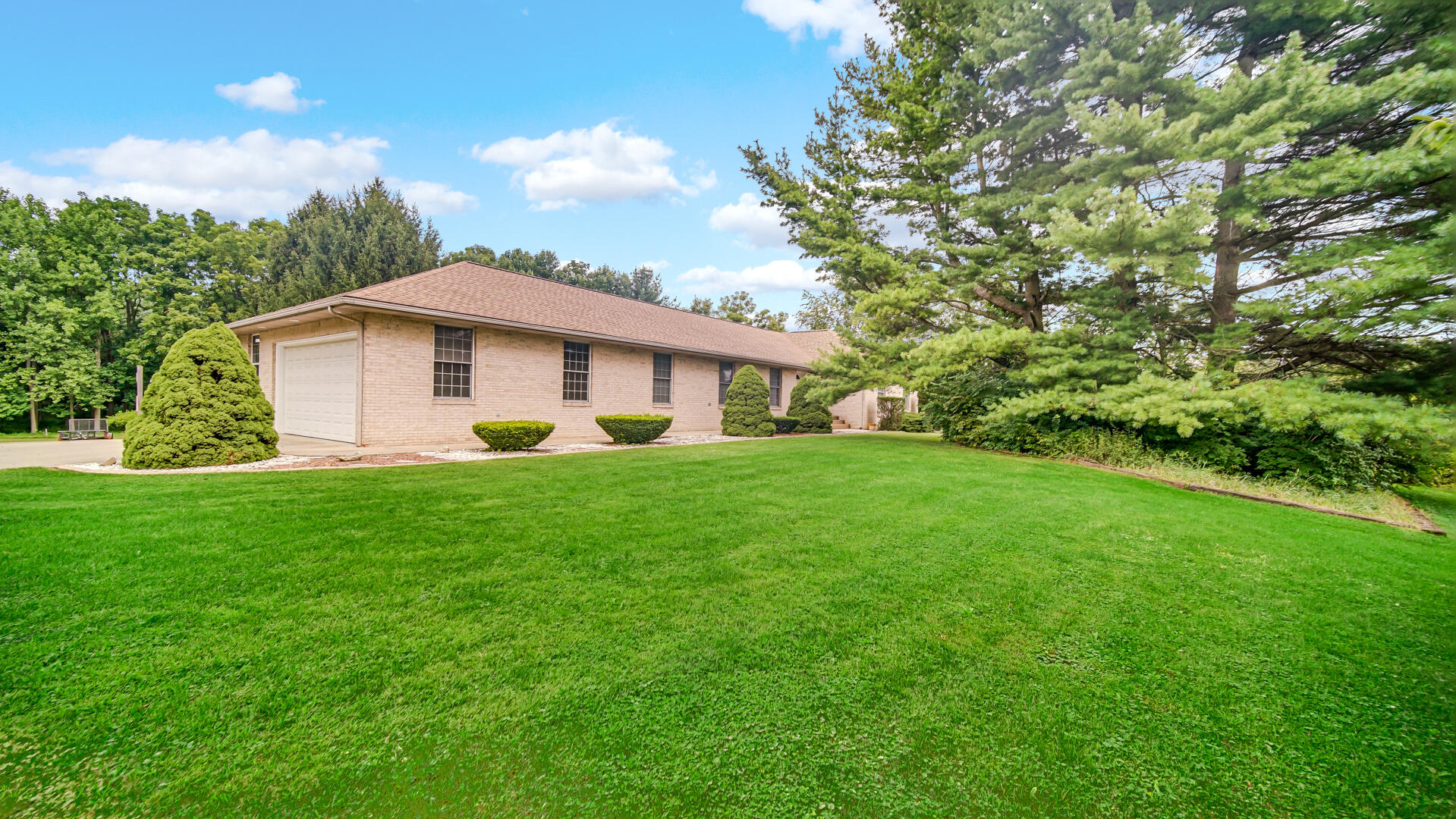 11339 West Snyder Road Westville, IN 46391 - Photo 2 of 27 a front view of house with yard and green space