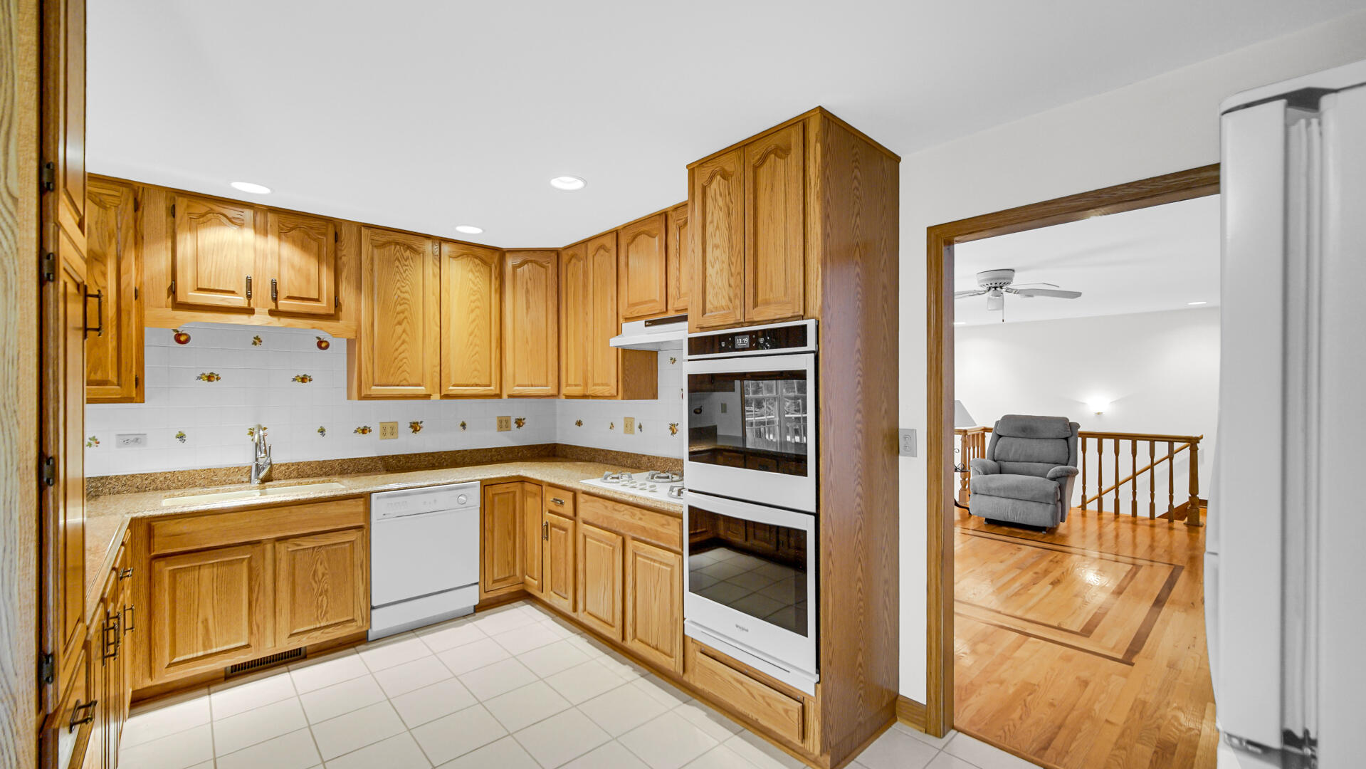 11339 West Snyder Road Westville, IN 46391 - Photo 7 of 27 a kitchen with stainless steel appliances granite countertop a stove and a sink