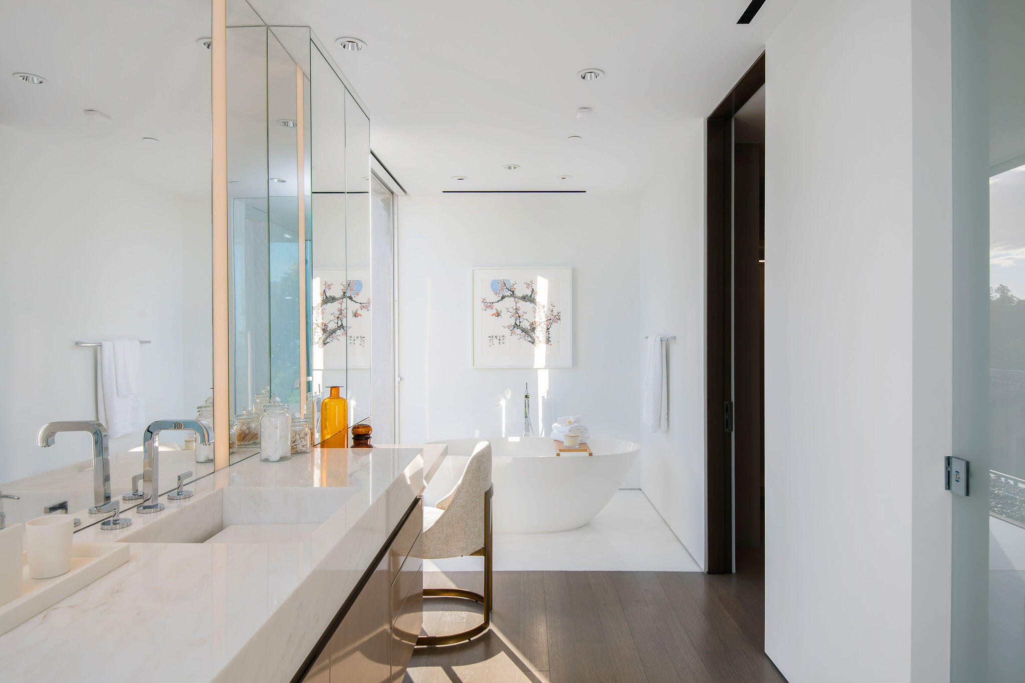1288 Angelo Drive Beverly Hills, CA 90210 - Photo 22 of 33 a bathroom with a sink and a mirror