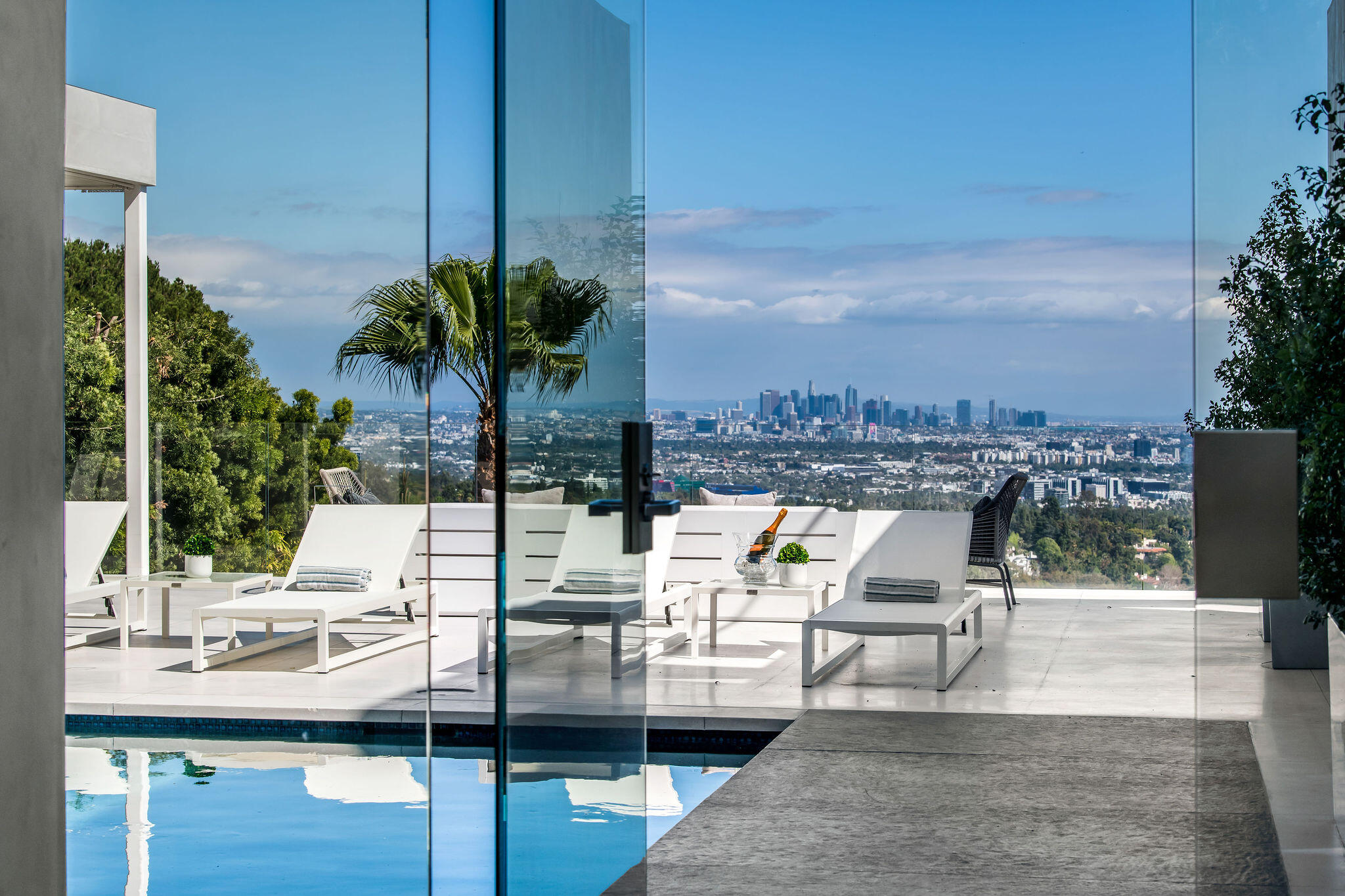 1288 Angelo Drive Beverly Hills, CA 90210 - Photo 3 of 33 a view of outdoor space with seating area