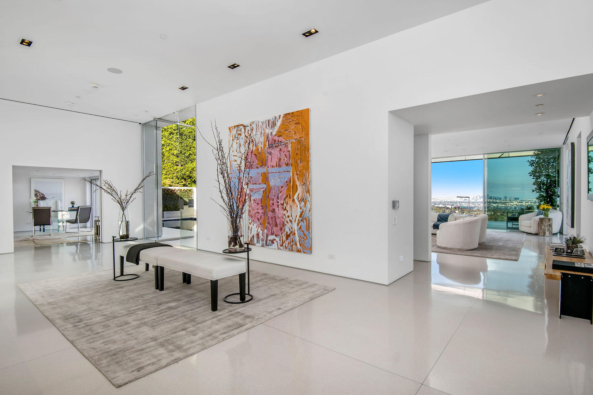 1288 Angelo Drive Beverly Hills, CA 90210 - Photo 5 of 33 a living room with furniture and a large window