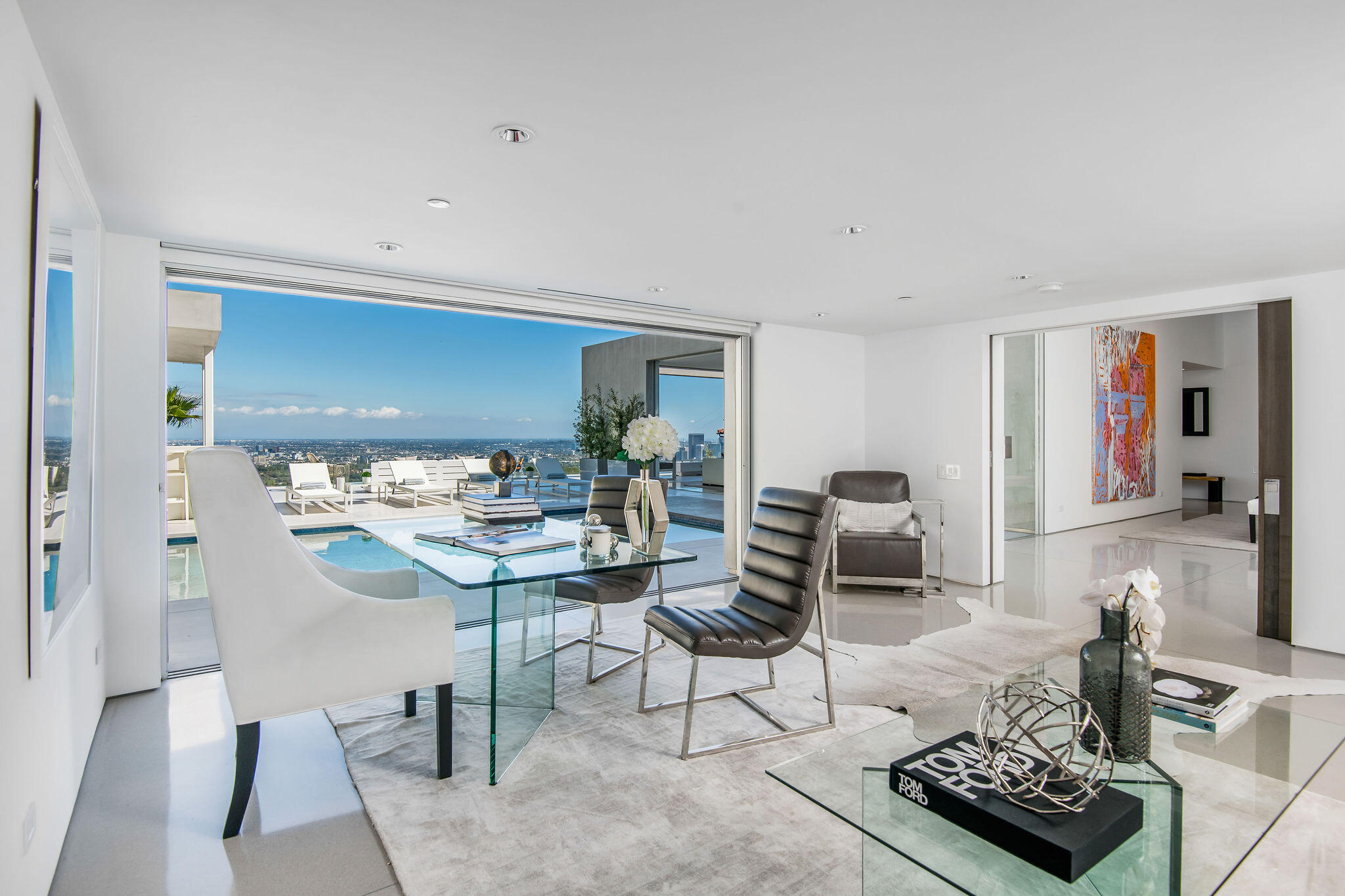 1288 Angelo Drive Beverly Hills, CA 90210 - Photo 9 of 33 a living room with furniture and a table