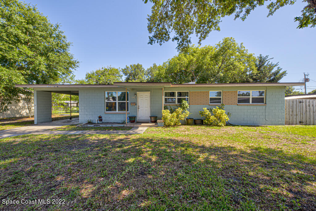 1210 Princeton Road Cocoa, FL 32922 - Photo 1 of 37 a front view of house with yard and green space