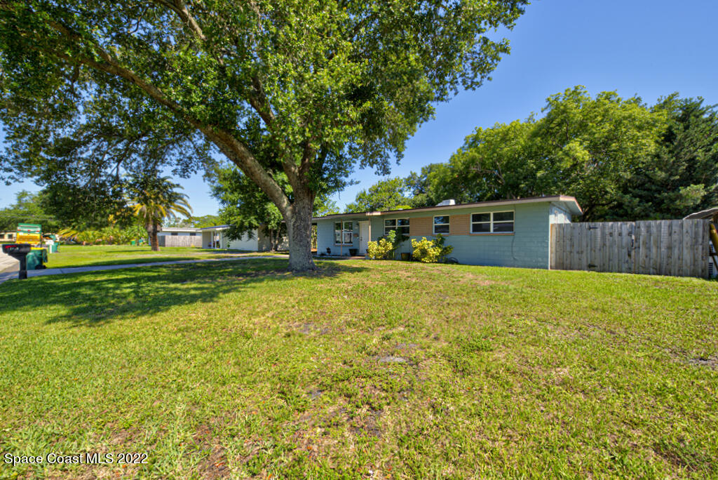 1210 Princeton Road Cocoa, FL 32922 - Photo 29 of 37 a front view of house with yard and green space
