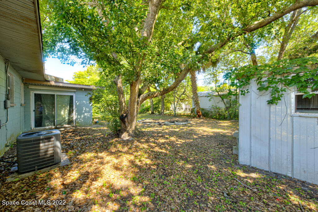 1210 Princeton Road Cocoa, FL 32922 - Photo 34 of 37 a view of a house with backyard and sitting area