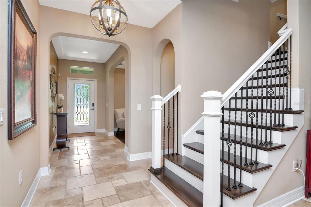 4527 Scarlet Loop Wesley Chapel, FL 33544 - Photo 16 of 33 a view of entryway with wooden floor