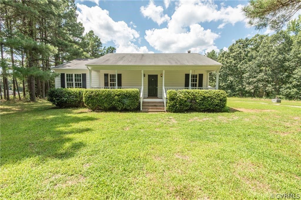 17550 Interstate Lane Dewitt, VA 23840 - Photo 1 of 29 a front view of a house with garden