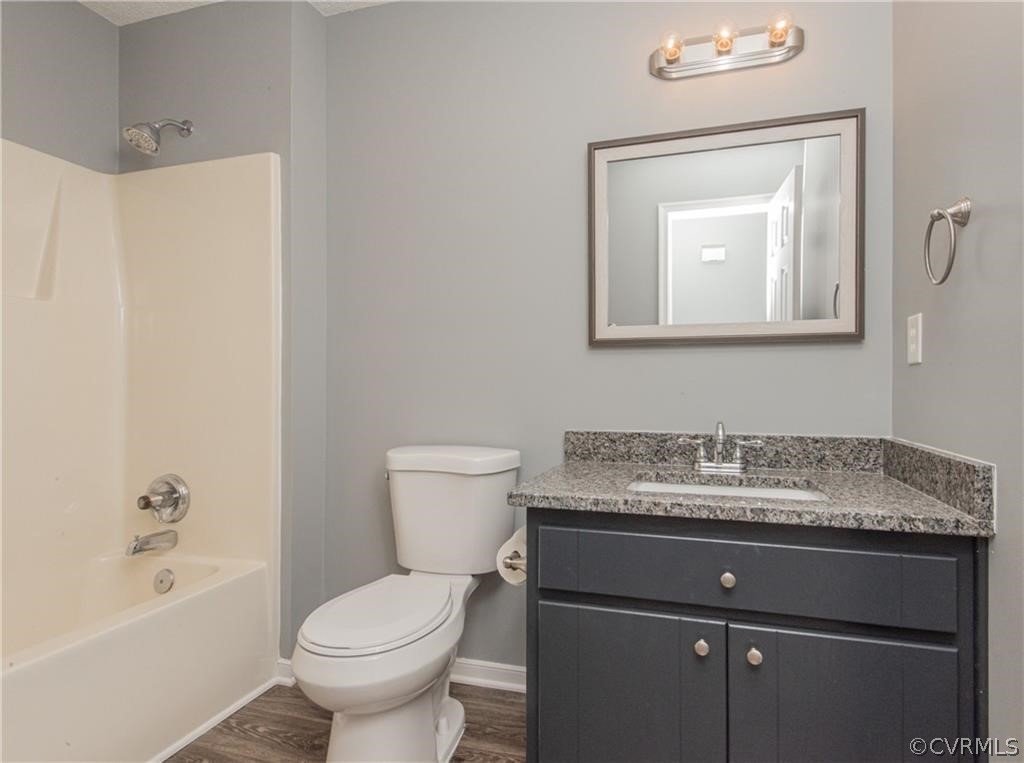 17550 Interstate Lane Dewitt, VA 23840 - Photo 16 of 29 a bathroom with a toilet sink and mirror