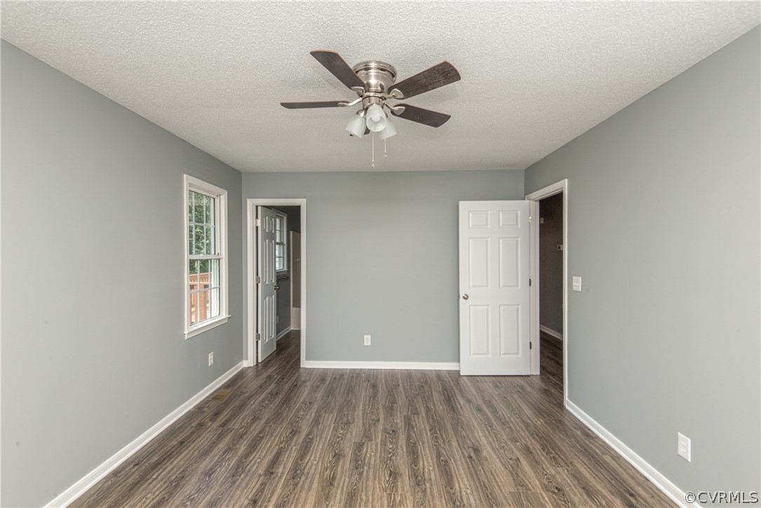 17550 Interstate Lane Dewitt, VA 23840 - Photo 23 of 29 a view of an empty room with wooden floor and a window