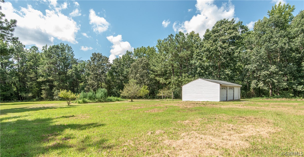 17550 Interstate Lane Dewitt, VA 23840 - Photo 29 of 29 a view of a field with a trees