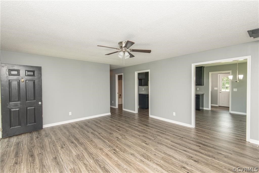 17550 Interstate Lane Dewitt, VA 23840 - Photo 5 of 29 wooden floor in an empty room with a window