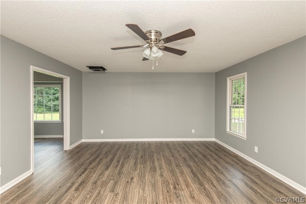 17550 Interstate Lane Dewitt, VA 23840 - Photo 7 of 29 wooden floor in an empty room with a window