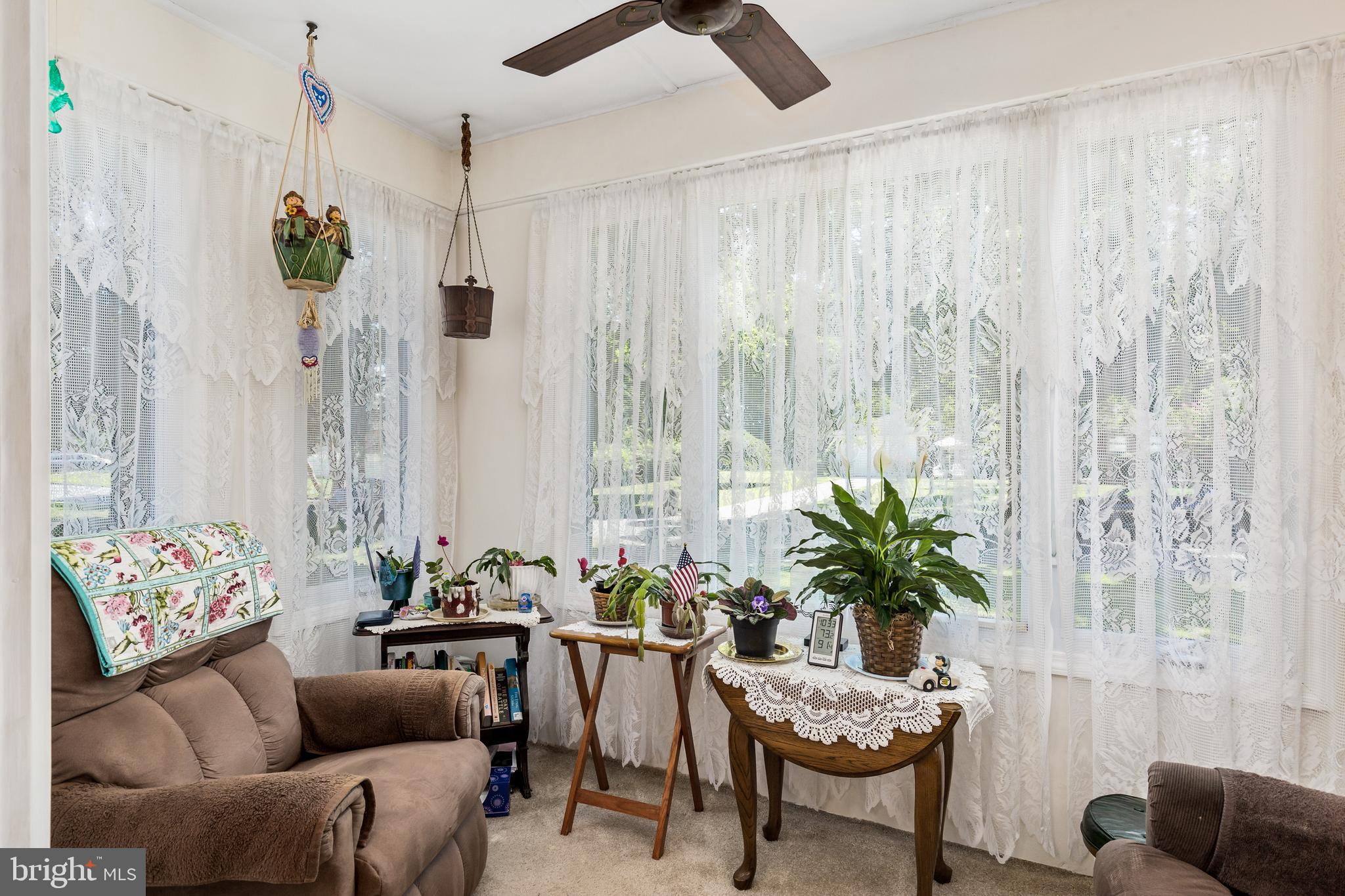 5 Cedar Lane Pemberton, NJ 08068 - Photo 5 of 27 Relax in this cozy sunporch off the dining area.