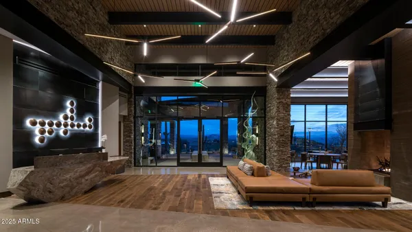 a outdoor living space with patio furniture and potted plants