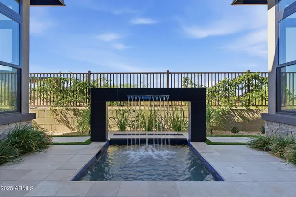 a view of a house with a street