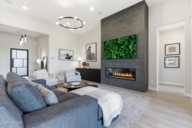 a bedroom with a bed and a fireplace