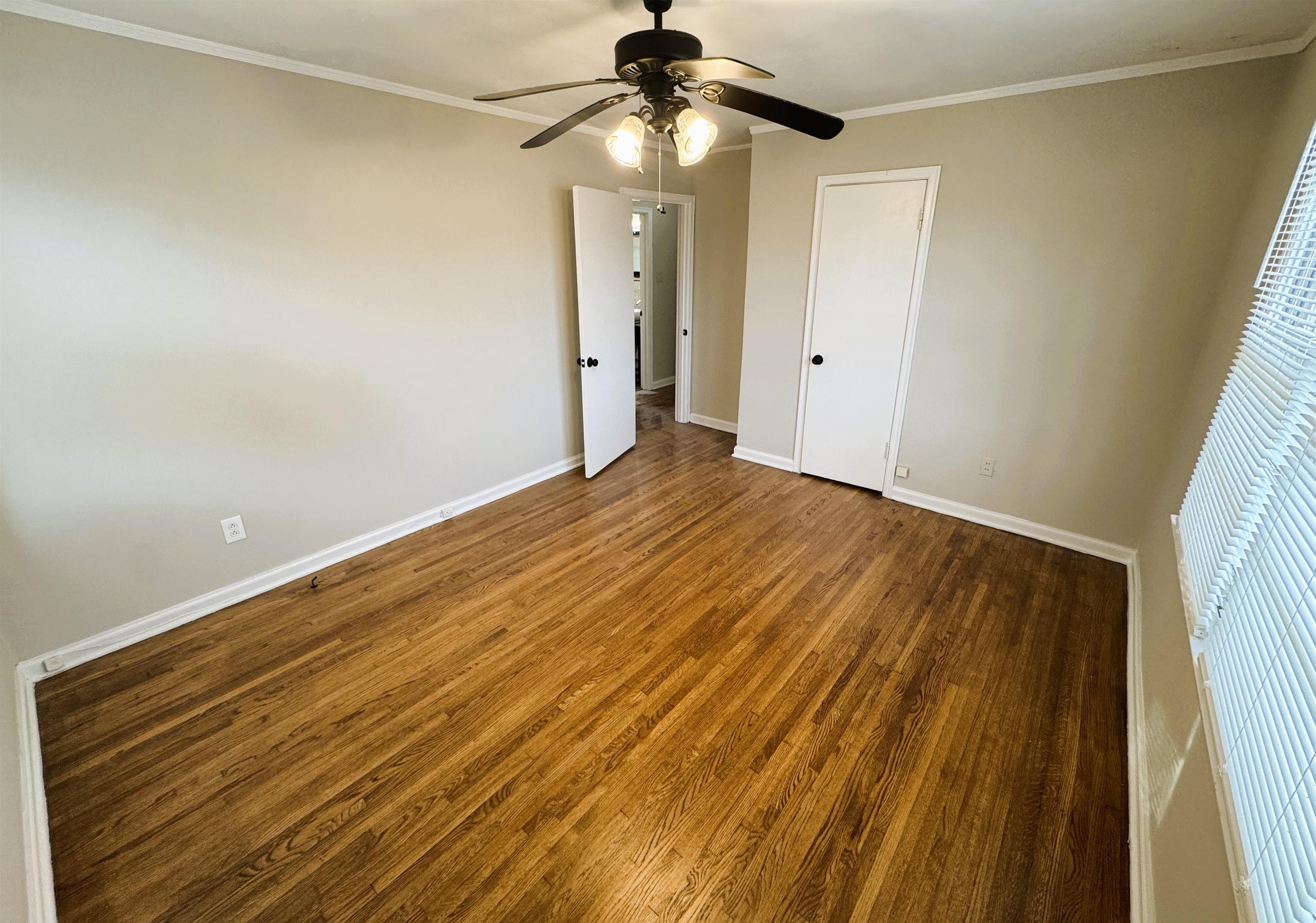 1331 Colonial Road Memphis, TN 38117 - Photo 12 of 18 a view of an empty room with a window