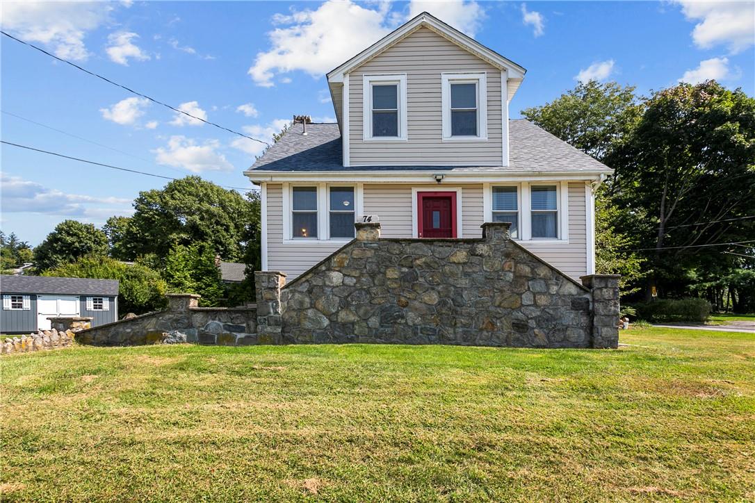 74 Cottage Road Carmel, NY 10512 - Photo 1 of 1 Welcome to our dormered Cape Cod home on a large corner lot with a distinctive stone staircase.
