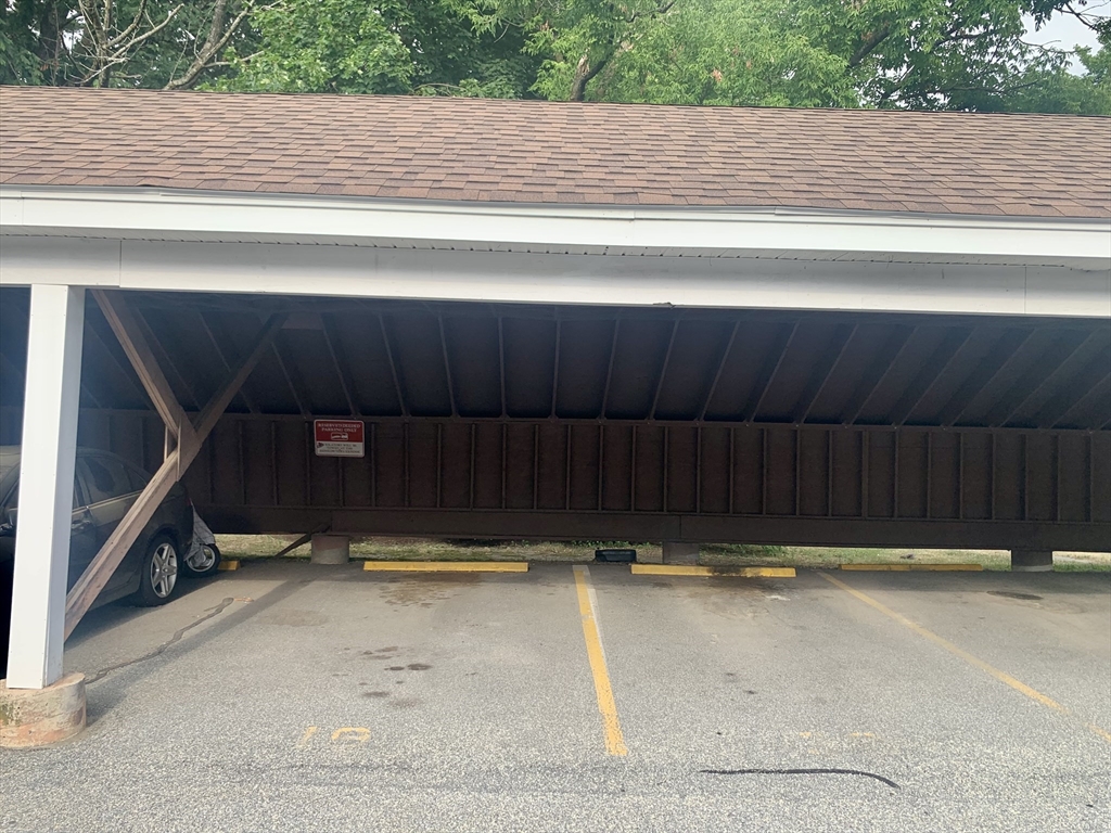 92 Beacon Street, Unit 6 Lawrence, MA 01843 - Photo 17 of 22 a view of a car garage
