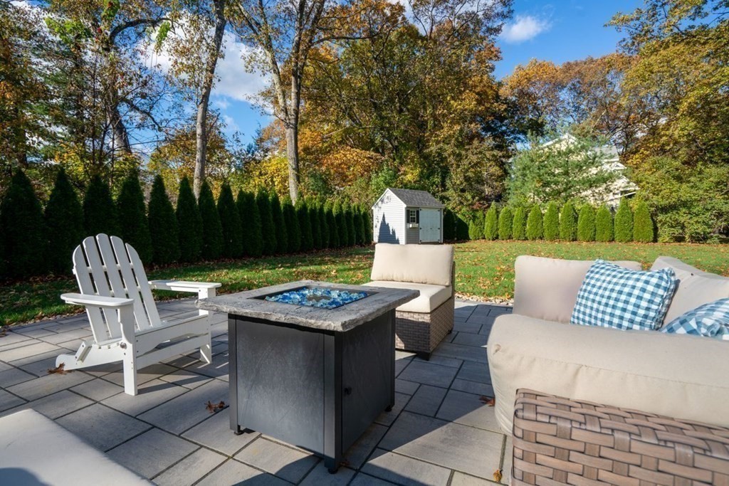 21 July Road Sudbury, MA 01776 - Photo 32 of 41 a view of a chairs and table in backyard