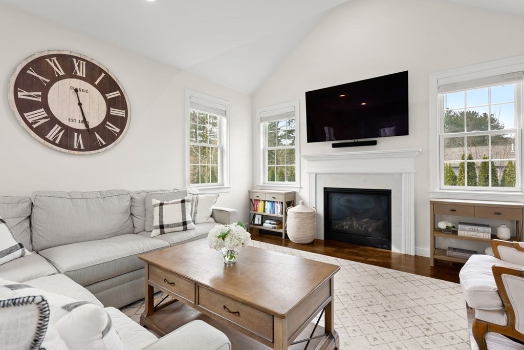 21 July Road Sudbury, MA 01776 - Photo 5 of 41 a living room with furniture fireplace and a flat screen tv