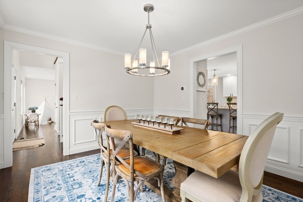 21 July Road Sudbury, MA 01776 - Photo 9 of 41 a view of a dining room furniture and chandelier