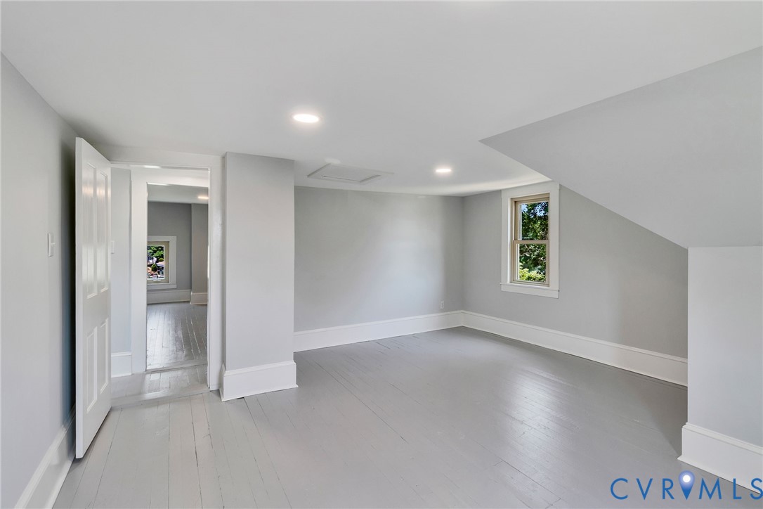 618 Main Street Reedville, VA 22539 - Photo 36 of 54 Finished attic space featuring light gray wood-fin