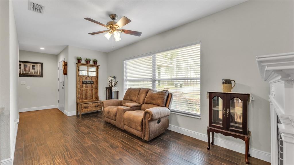 815 West Socrum Loop Road Lakeland, FL 33809 - Photo 15 of 41 a living room with furniture and a window