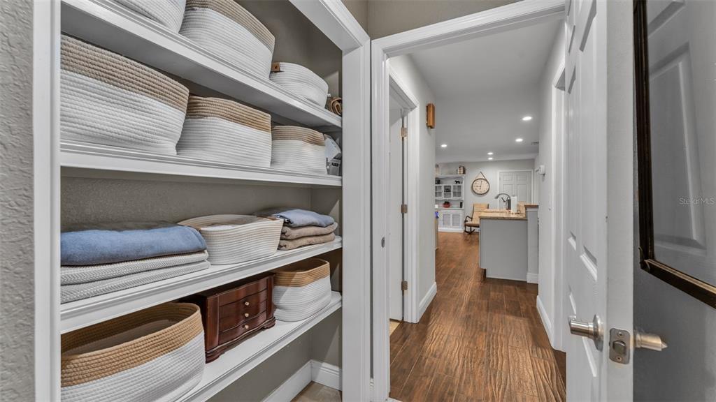 815 West Socrum Loop Road Lakeland, FL 33809 - Photo 21 of 41 a view of kitchen and hall with wooden floor