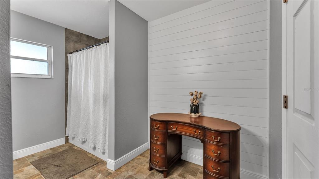 815 West Socrum Loop Road Lakeland, FL 33809 - Photo 25 of 41 a bathroom with a sink and a mirror