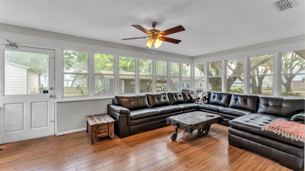 815 West Socrum Loop Road Lakeland, FL 33809 - Photo 31 of 41 a living room with furniture and a large window