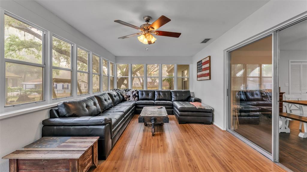 815 West Socrum Loop Road Lakeland, FL 33809 - Photo 32 of 41 a living room with furniture and a large window