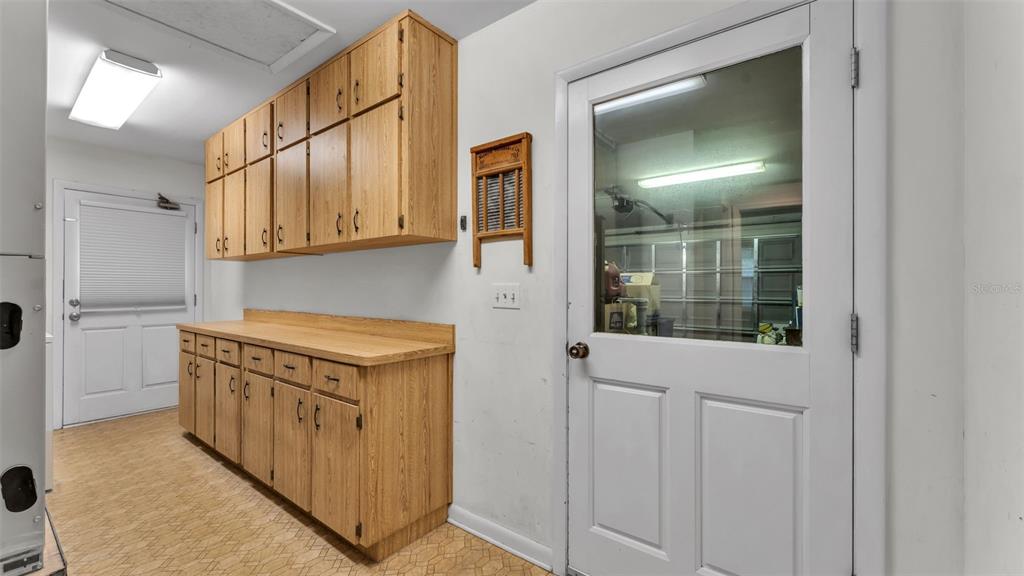 815 West Socrum Loop Road Lakeland, FL 33809 - Photo 33 of 41 a kitchen with stainless steel appliances granite countertop a refrigerator and a sink