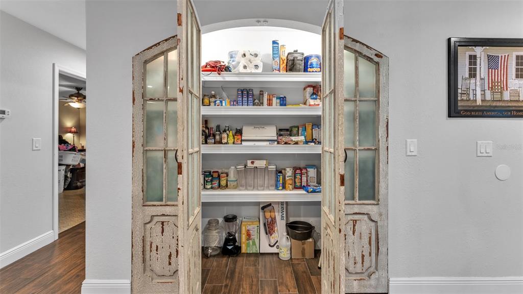 815 West Socrum Loop Road Lakeland, FL 33809 - Photo 6 of 41 a view of front door and livingroom with furniture