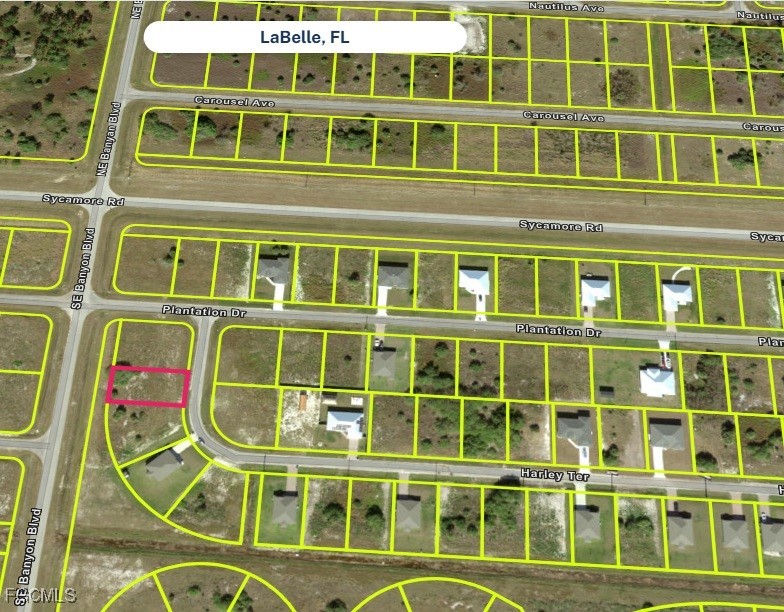 102 Harley Terrace LaBelle, FL 33935 - Photo 2 of 2 a large building with a windows