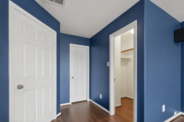 a view of small space with racks on the wall