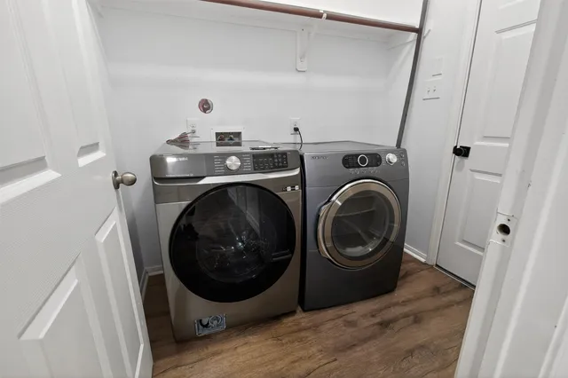 a utility room with dryer and washer