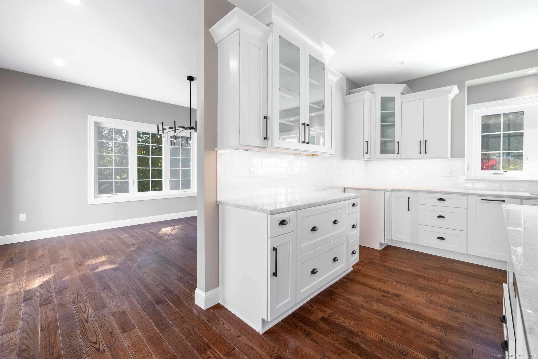 10 Maple View Trail Litchfield, CT 06759 - Photo 11 of 39 a kitchen with granite countertop a large window and a sink