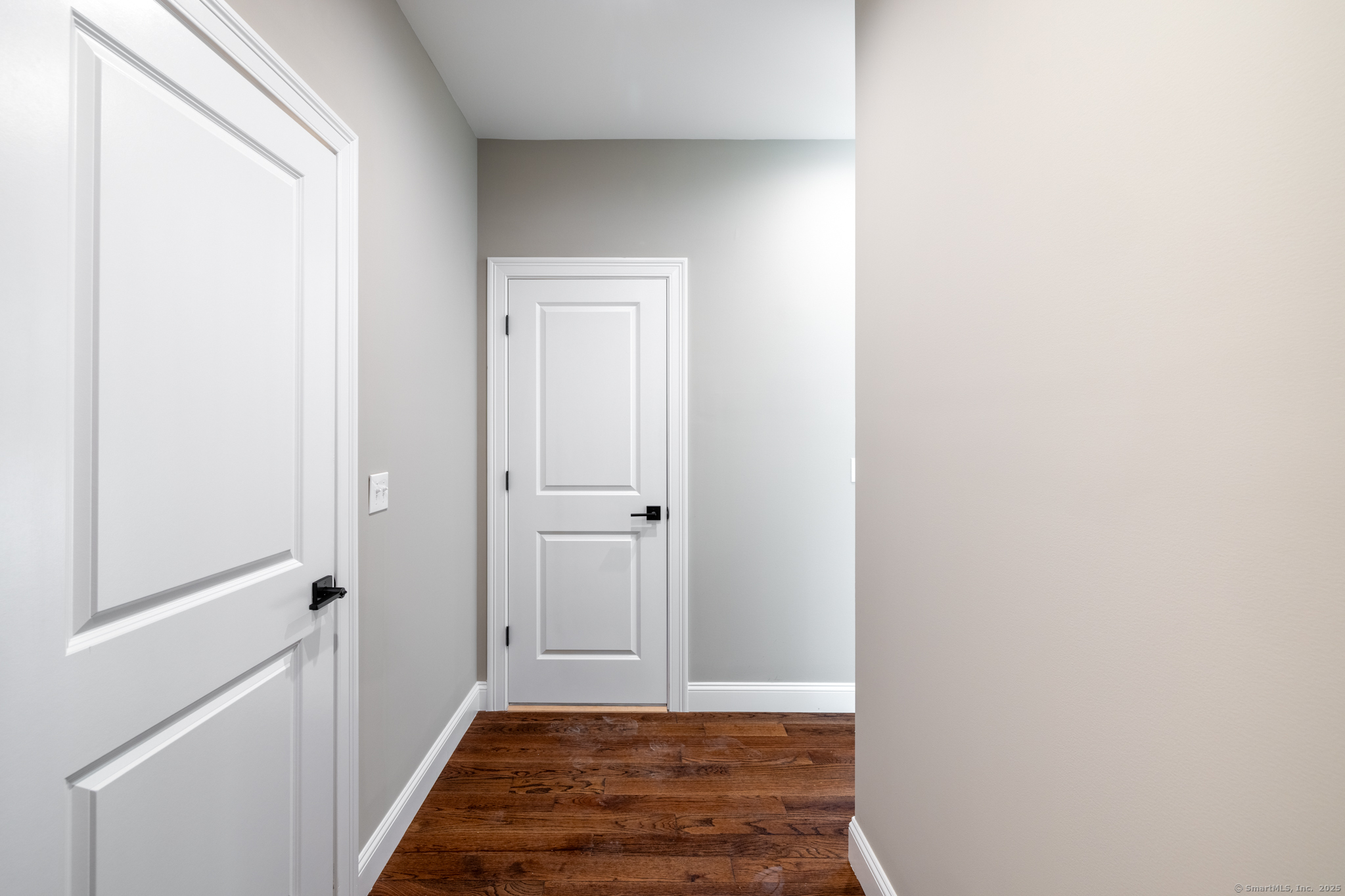 10 Maple View Trail Litchfield, CT 06759 - Photo 15 of 39 a view of a hallway with wooden floor